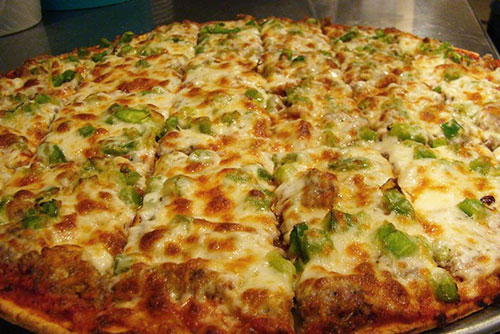 $42 2 Large 1-Topping Pizzas & 8 Piece Bucket of Chicken at Ole Piper Restaurant & Sports Bar