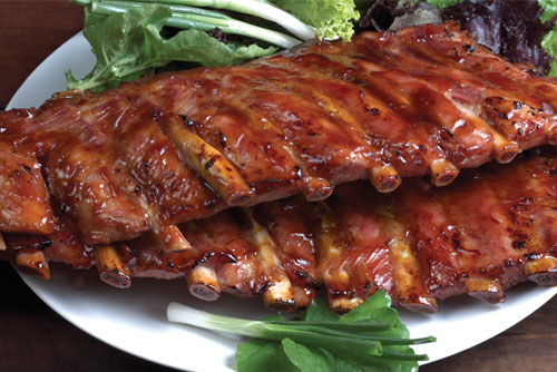 $5 OFF Any Purchase of $25 or More at Wild Boar Bar & Grill