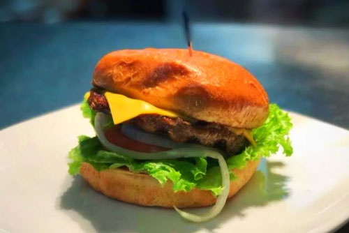 FREE Side & Beverage with purchase of a Reg. Priced Burger at Basement Burger Bar